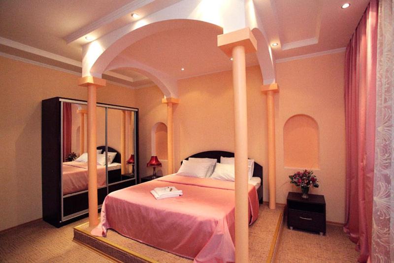 Кровать или кровати в номере Гостиница Атаман