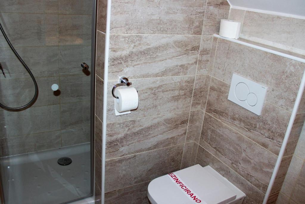 Koupelna v ubytování Apartments Koblar