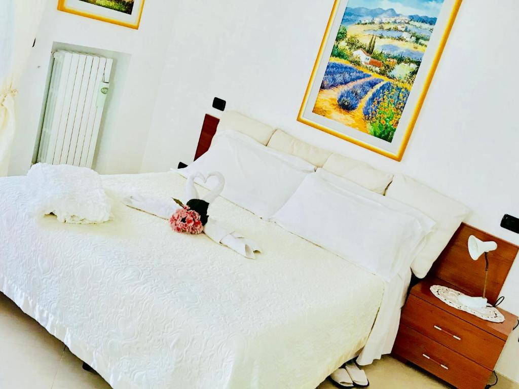 Postel nebo postele na pokoji v ubytování Villa Aurora B&B
