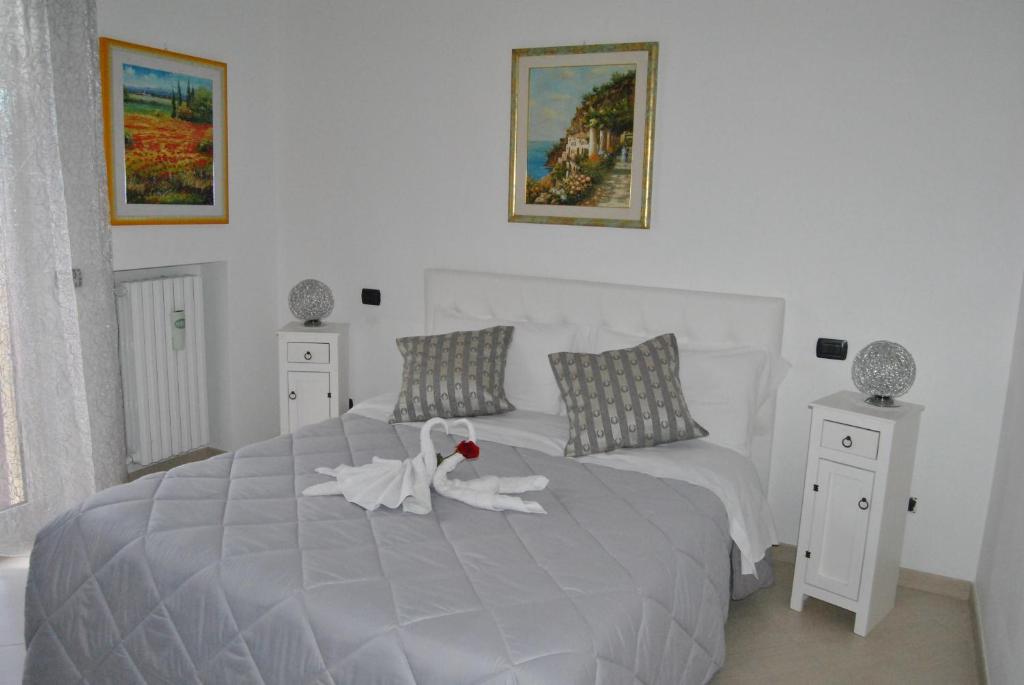Postel nebo postele na pokoji v ubytování Villa Aurora B&B