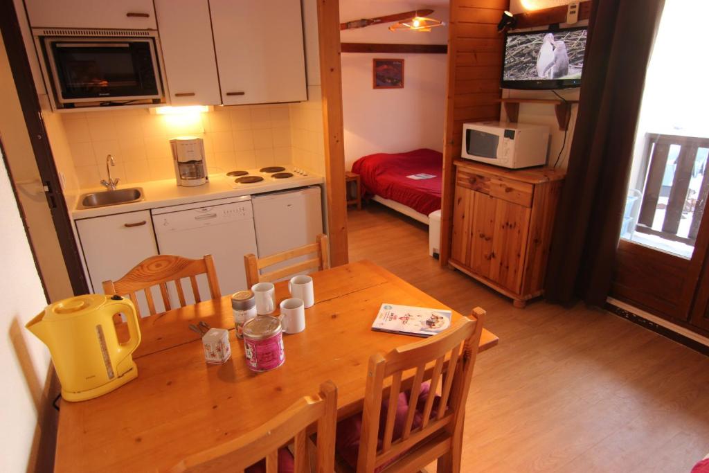 Kuchyň nebo kuchyňský kout v ubytování Reine Blanche Appartements VTI