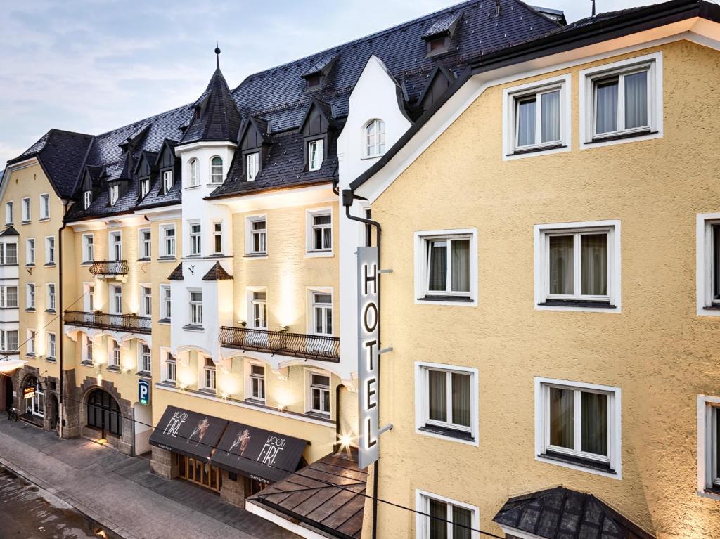 a row of buildings on a street at Hotel Grauer Bär in Innsbruck