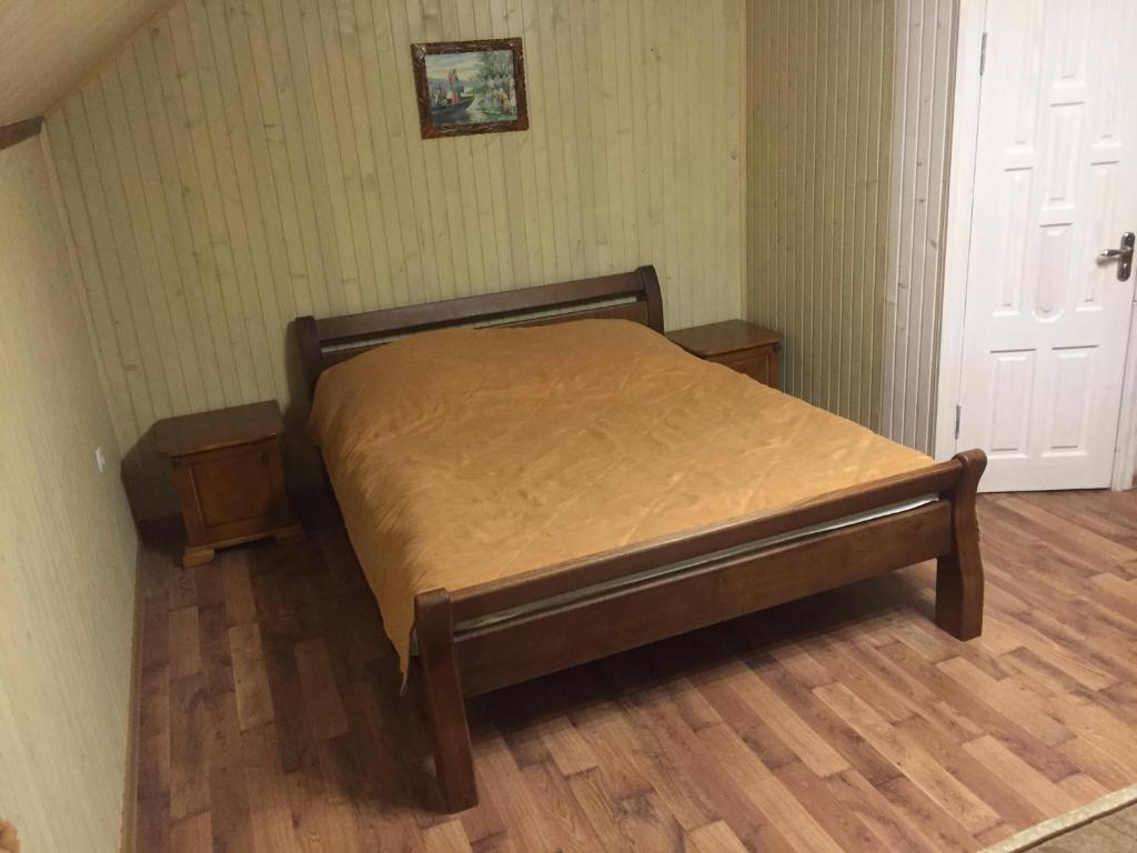Voodi või voodid majutusasutuse Guest House U Myrona toas