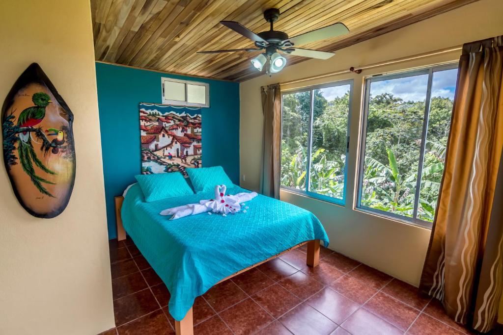 Postel nebo postele na pokoji v ubytování Hotel Nepenthe B&B