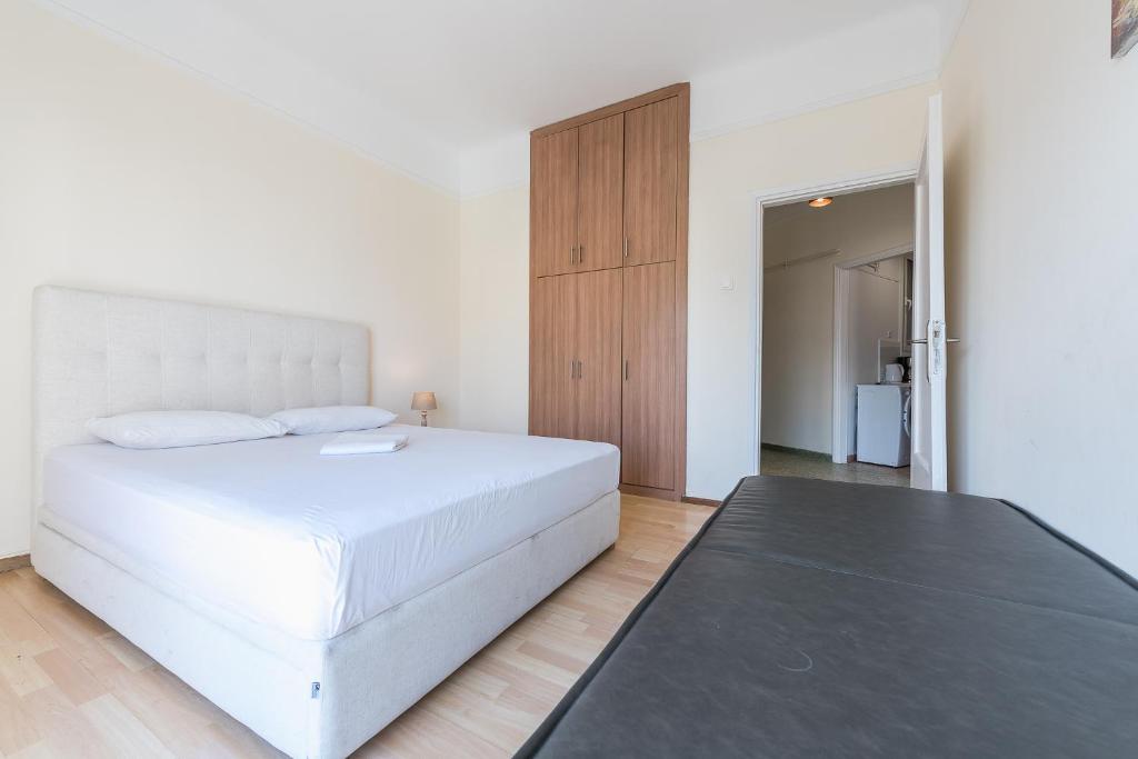 Posteľ alebo postele v izbe v ubytovaní Super Paradise Apartments