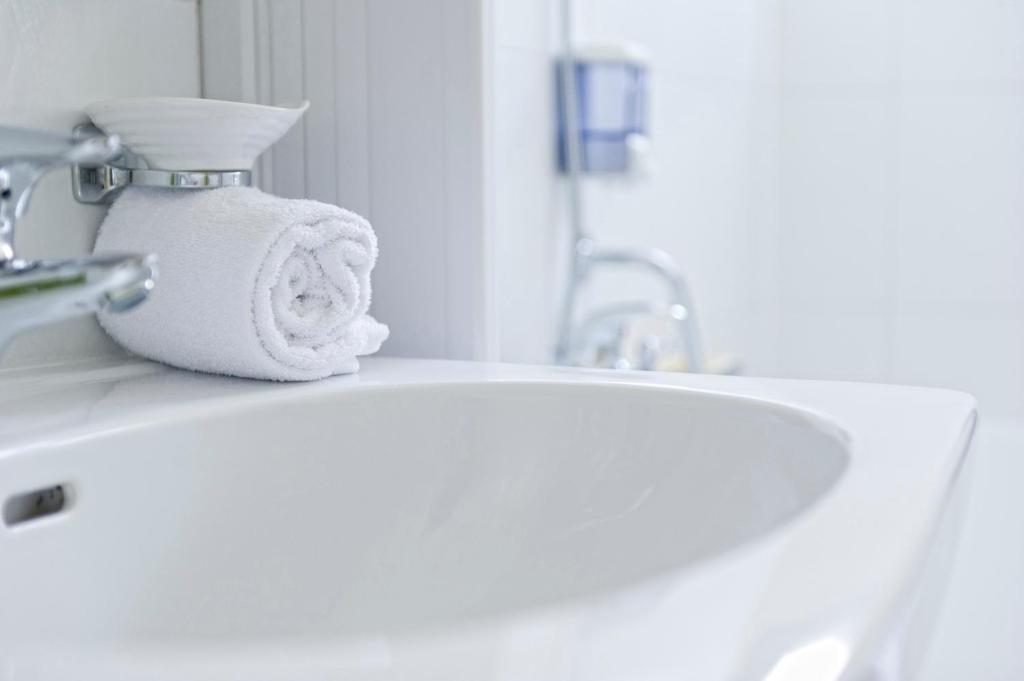 Koupelna v ubytování Hotel Tiziana