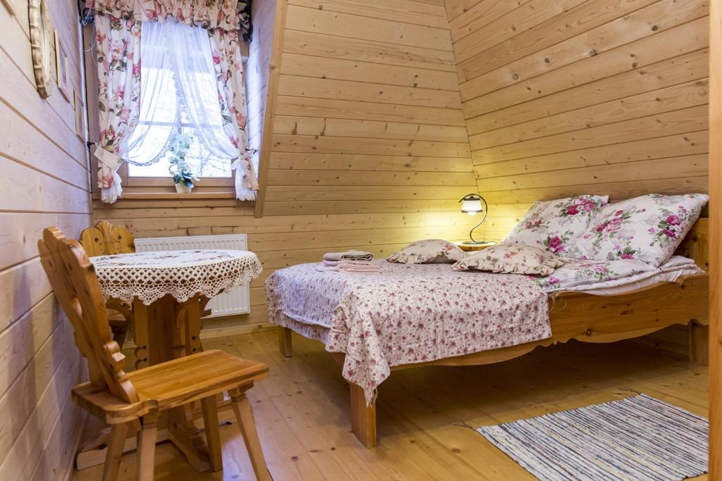 Posteľ alebo postele v izbe v ubytovaní Smrekowe Domki