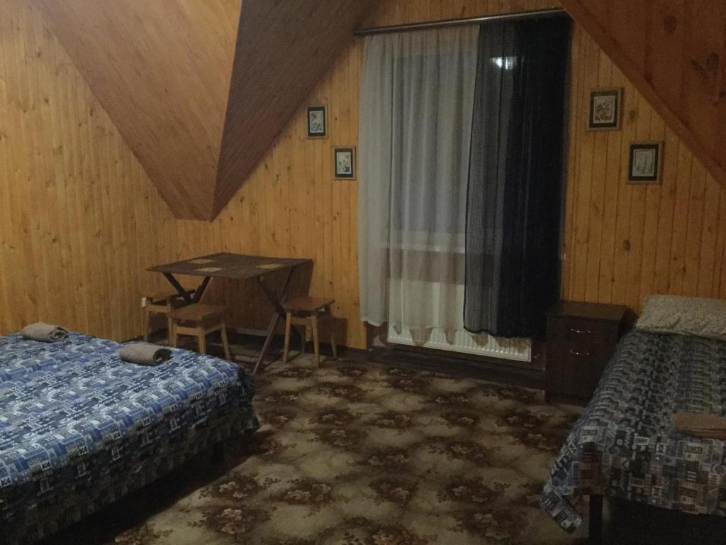 Postel nebo postele na pokoji v ubytování Hotel Fortetsya