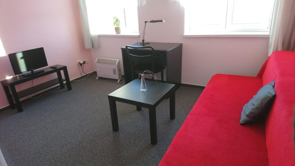 TV a/nebo společenská místnost v ubytování Hotel Šrejber