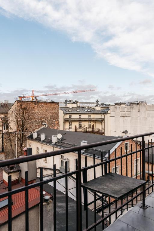 Balkón alebo terasa v ubytovaní Rotunda Apartment - LoftAffair