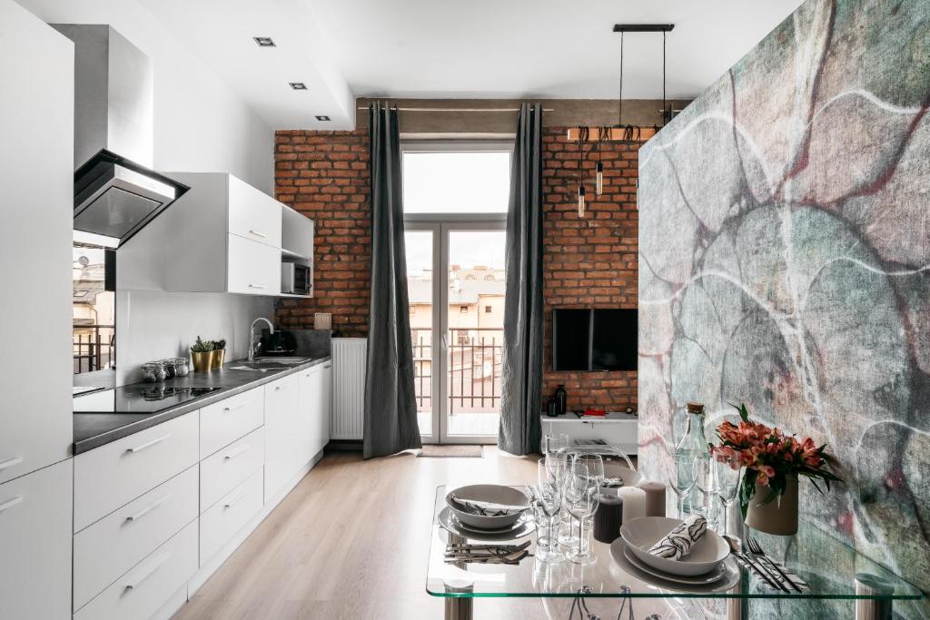 Kuchyňa alebo kuchynka v ubytovaní Rotunda Apartment - LoftAffair