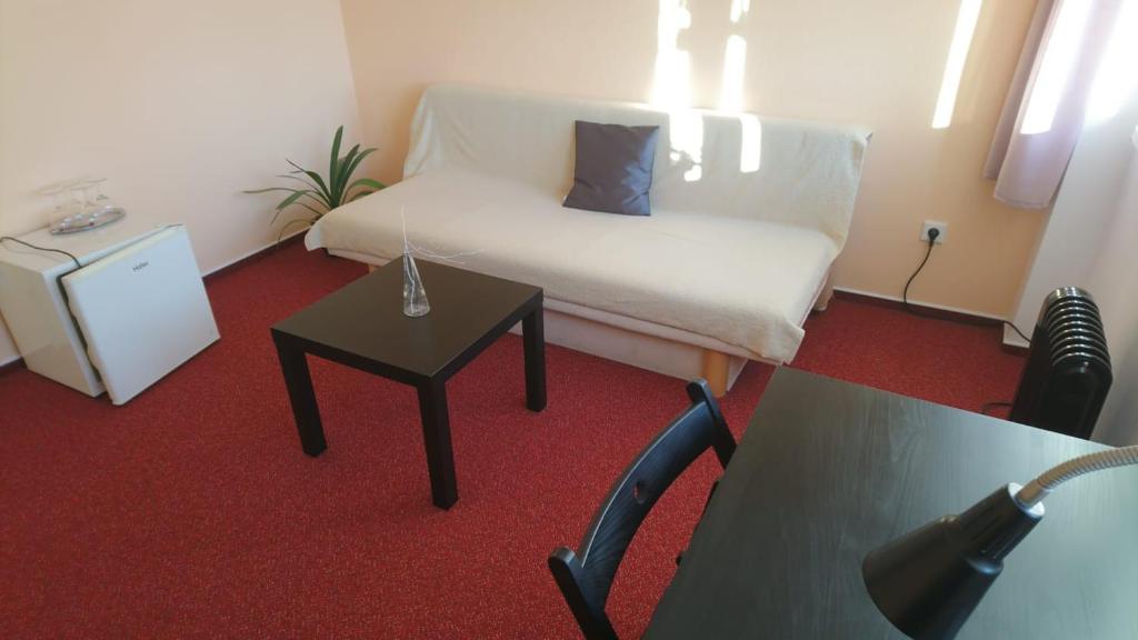Postel nebo postele na pokoji v ubytování Hotel Šrejber
