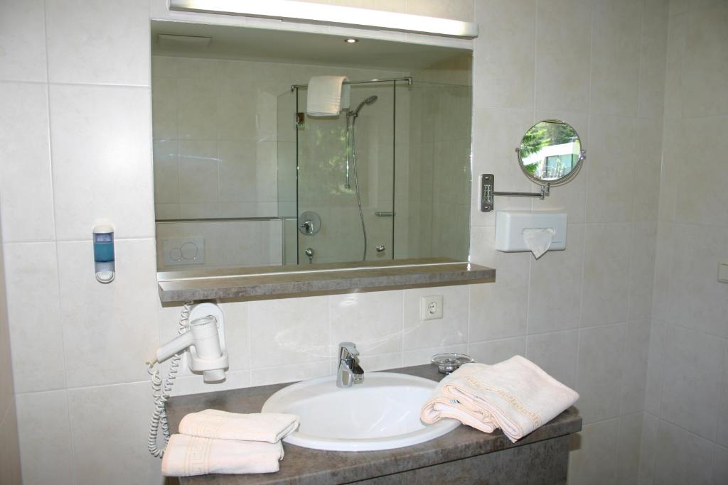 Koupelna v ubytování Hotel Hochland