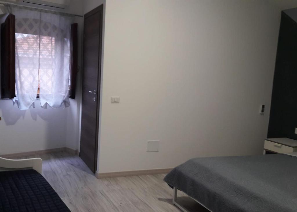 Postel nebo postele na pokoji v ubytování Sa domu rubia