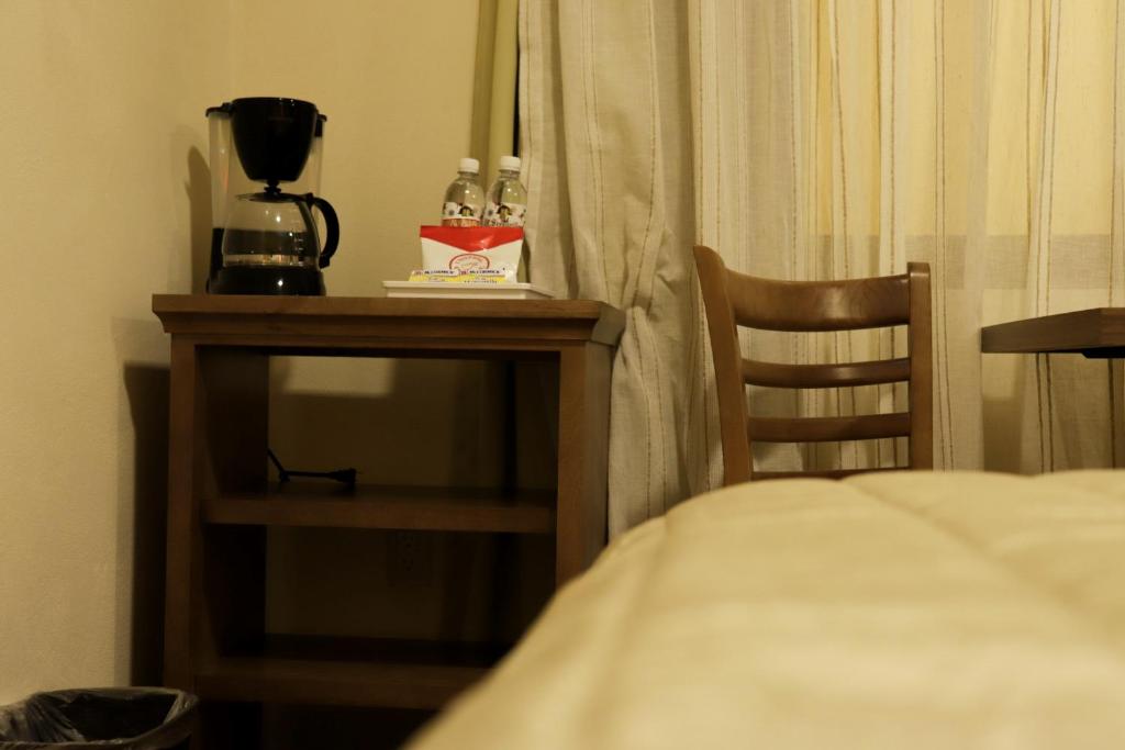 Postel nebo postele na pokoji v ubytování Hotel JYE by Serranillo, Mineral del Monte Hgo