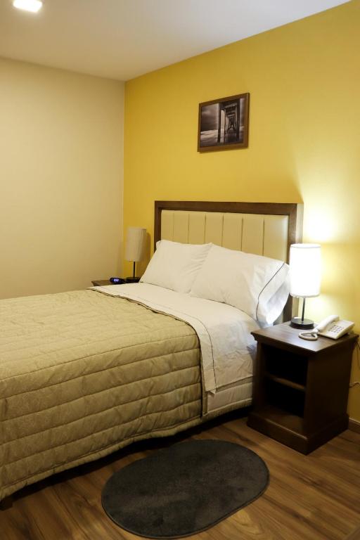 Postel nebo postele na pokoji v ubytování Hotel JYE by Serranillo, Mineral del Monte Hgo