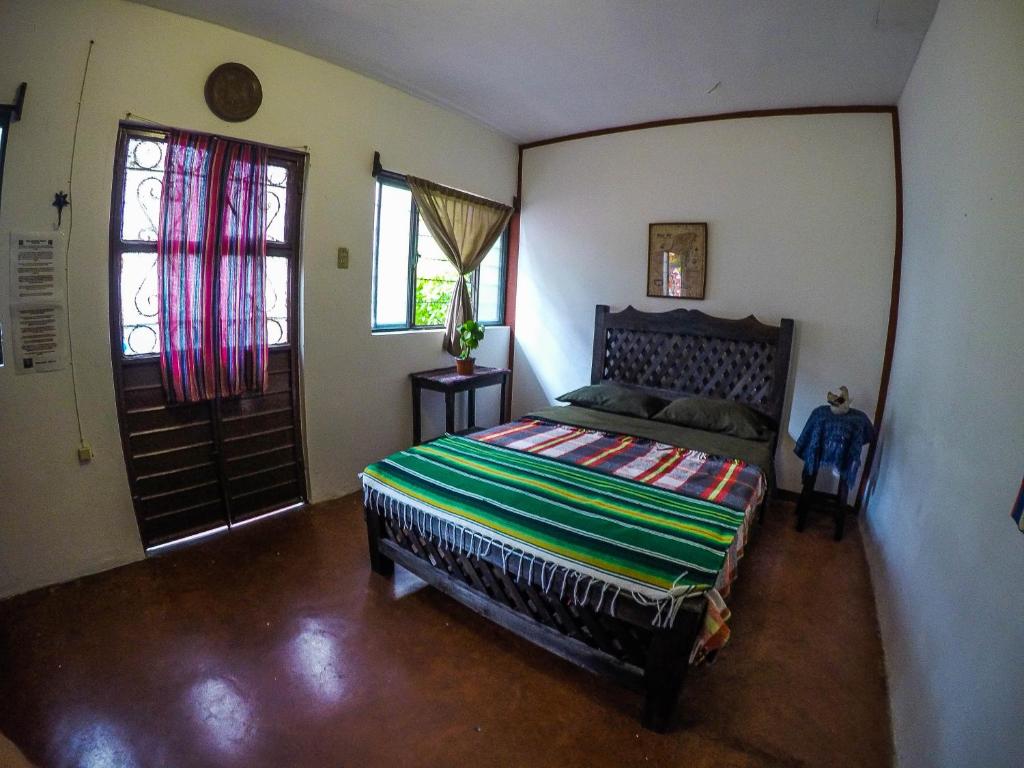 Postel nebo postele na pokoji v ubytování Hostel El Nagual