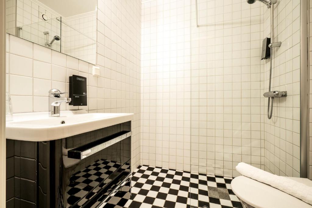 Ванная комната в Hotell Granen