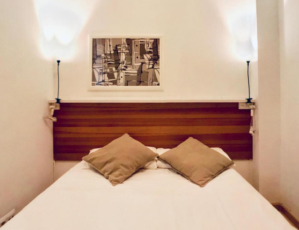 Cama o camas de una habitación en Bed&BCN Gracia II