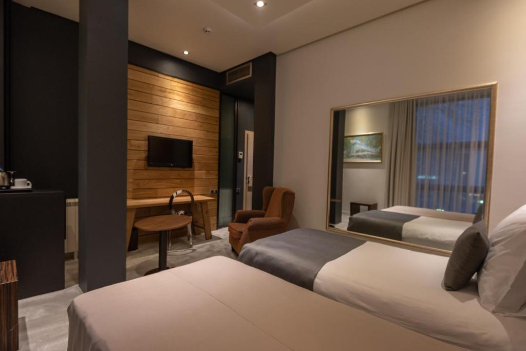 Postel nebo postele na pokoji v ubytování Hotel ABC