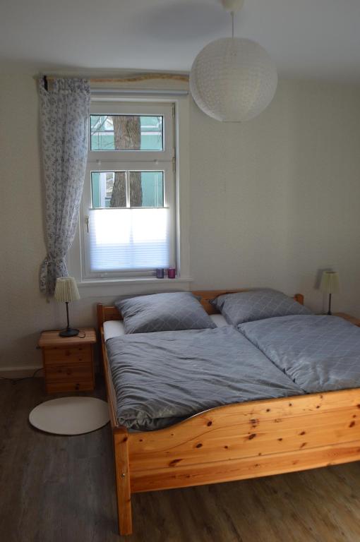 Postel nebo postele na pokoji v ubytování Ferienwohnung "Auszeit"