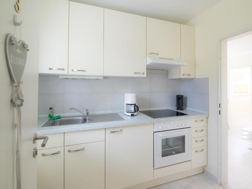 Kuchyň nebo kuchyňský kout v ubytování Haus Regina