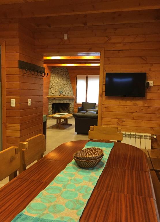 TV a/nebo společenská místnost v ubytování Encanto del Rio