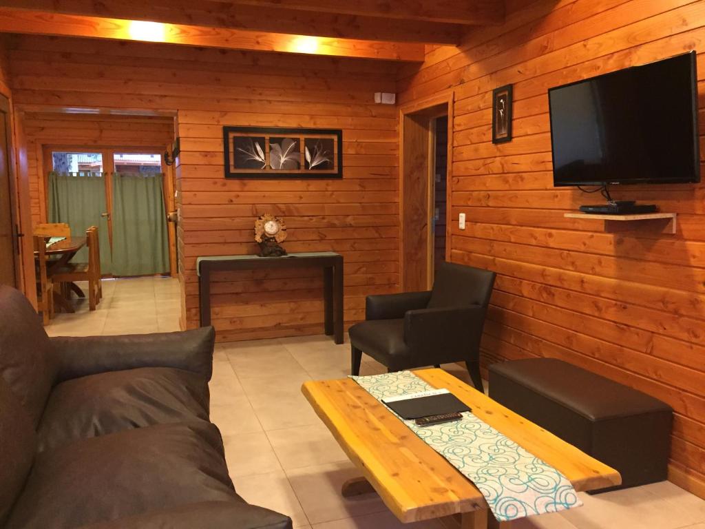 TV a/nebo společenská místnost v ubytování Encanto del Rio