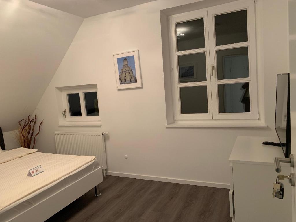 TV a/nebo společenská místnost v ubytování Zentrum Appartment Neuburg