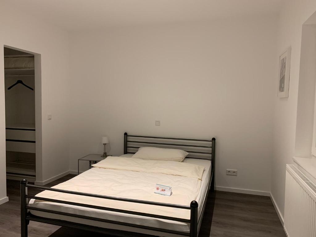 Postel nebo postele na pokoji v ubytování Zentrum Appartment Neuburg