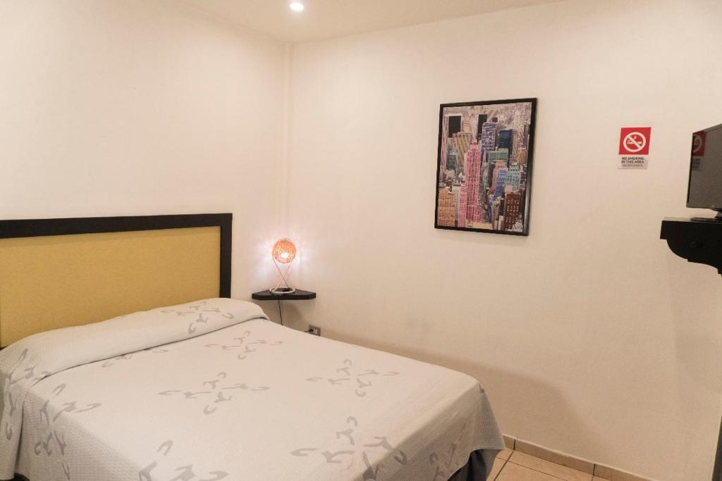 Voodi või voodid majutusasutuse Micro Hotel Rio de Piedras toas