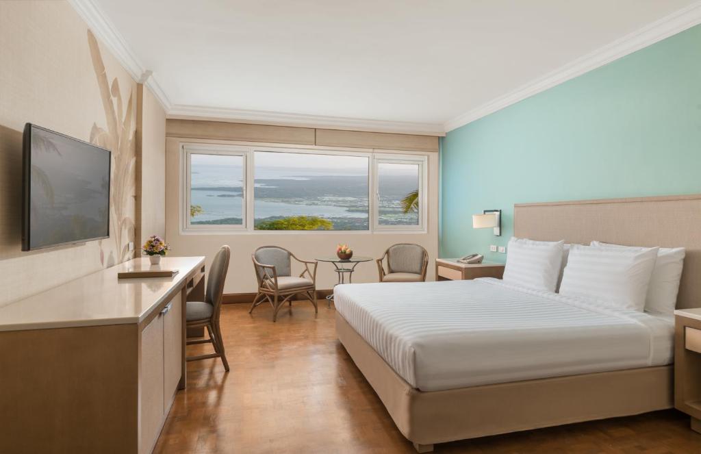 TV a/nebo společenská místnost v ubytování Taal Vista Hotel