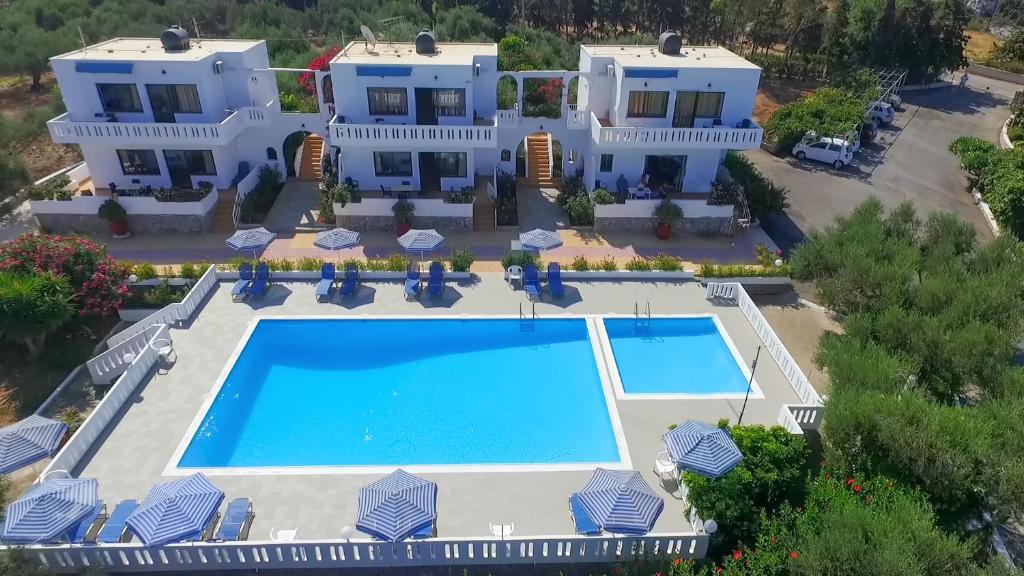 an aerial view of a villa with a swimming pool at Villas Michalis in Chorafakia