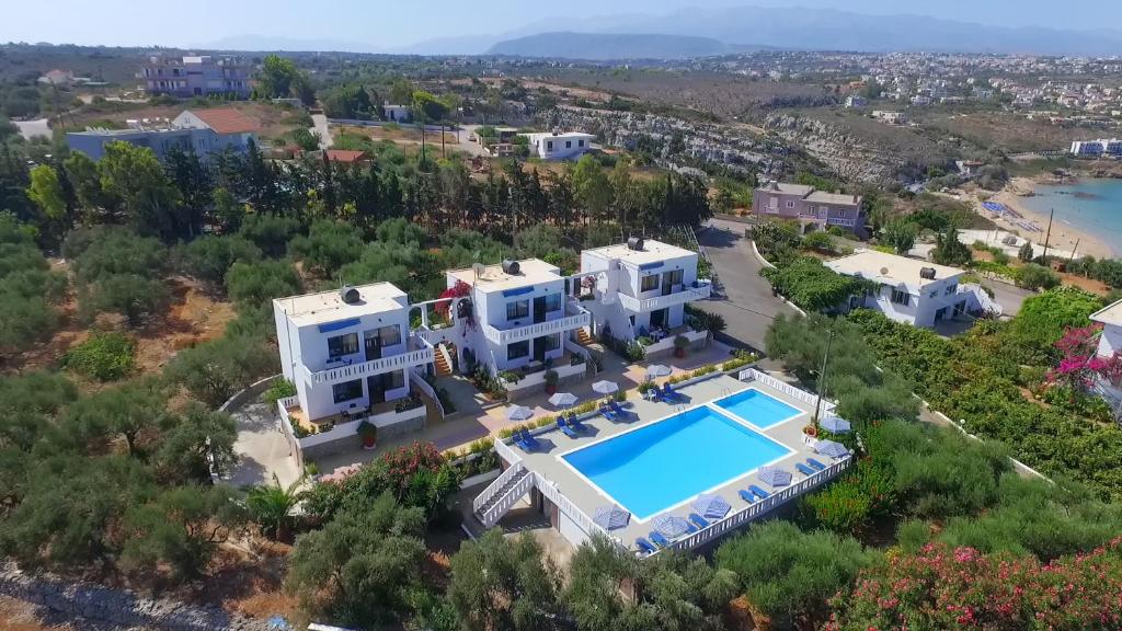 an aerial view of a villa with a swimming pool at Villas Michalis in Chorafakia