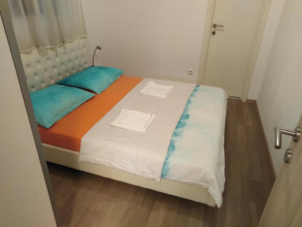 Posteľ alebo postele v izbe v ubytovaní Centar Split Apartments Manuš