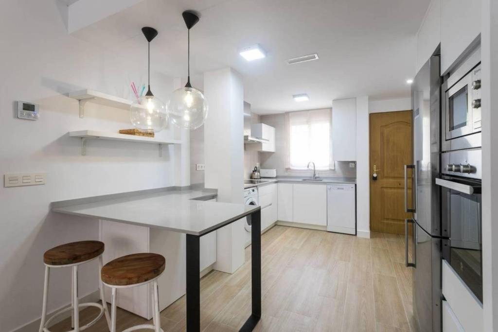Kuchyň nebo kuchyňský kout v ubytování New San Juan beach apartment with AC