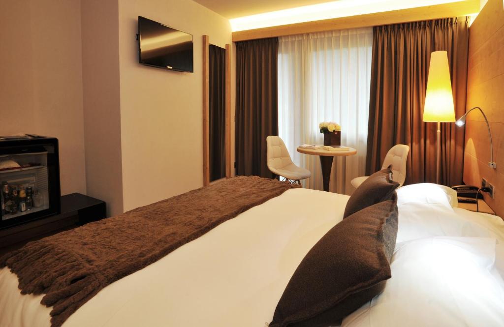 Postel nebo postele na pokoji v ubytování Palace Hotel Wellness & Beauty