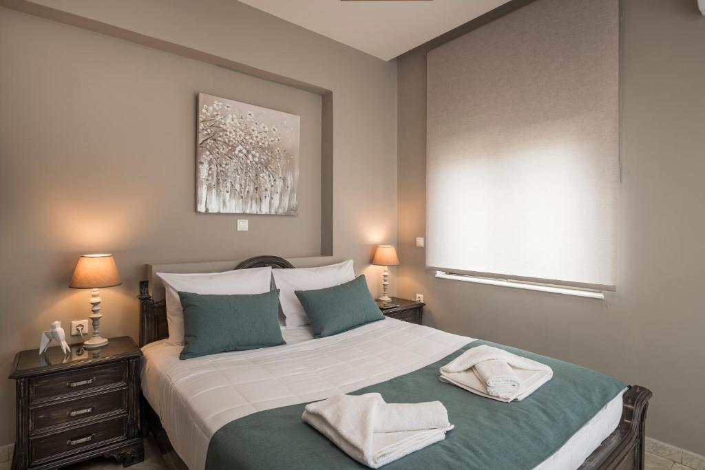 Postel nebo postele na pokoji v ubytování Mirma Luxury Apartment