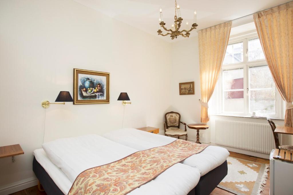 Postel nebo postele na pokoji v ubytování Hotell Breda Blick