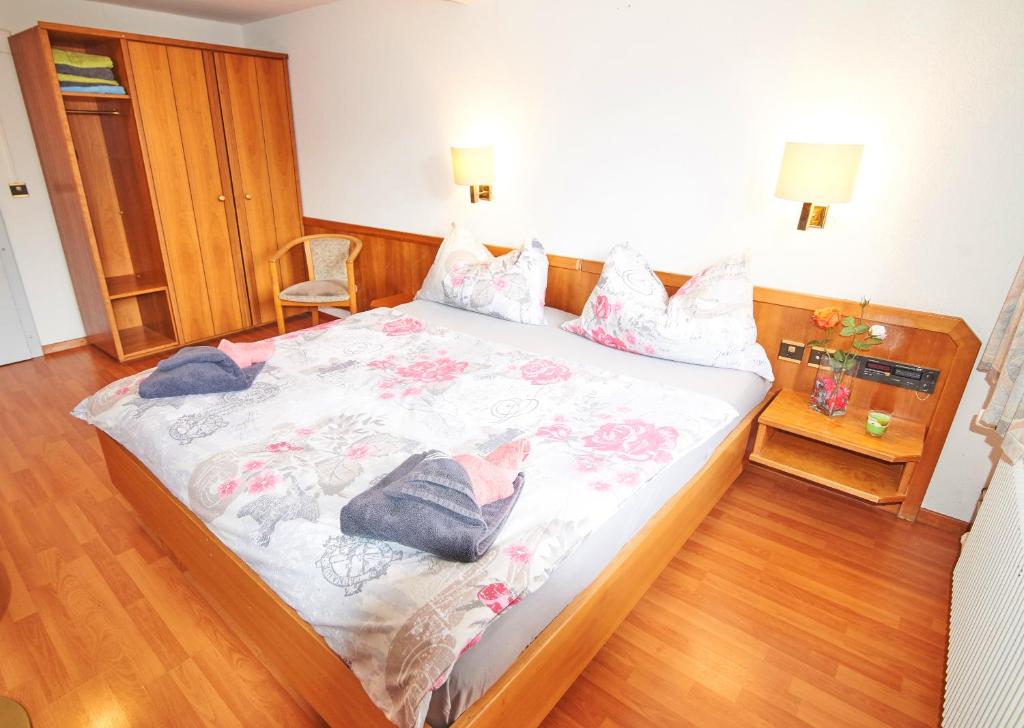 Postel nebo postele na pokoji v ubytování Residence Jungfrau