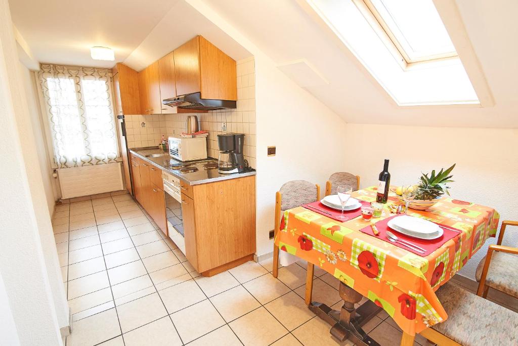 Kuchyň nebo kuchyňský kout v ubytování Residence Jungfrau