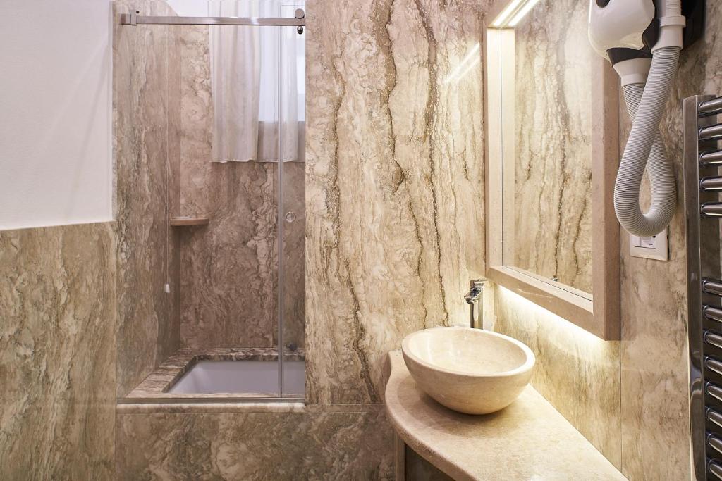 Koupelna v ubytování Albergo Chiusarelli