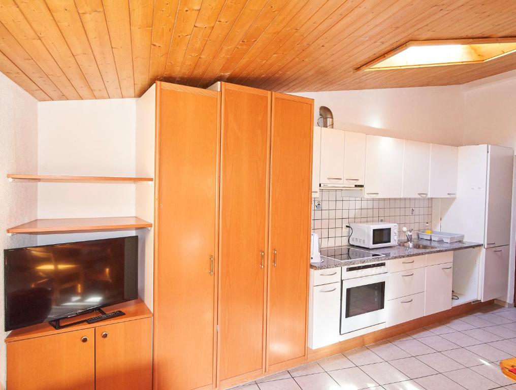 Kuchyň nebo kuchyňský kout v ubytování Residence Jungfrau
