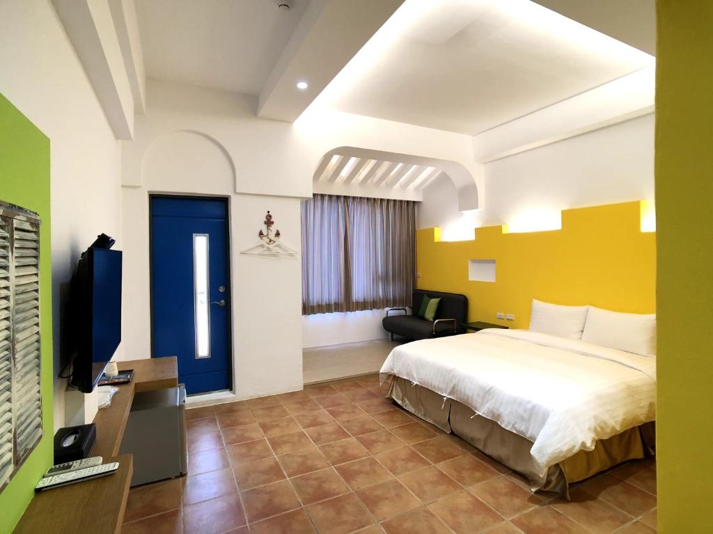 Voodi või voodid majutusasutuse Kenting True Color Hostel toas
