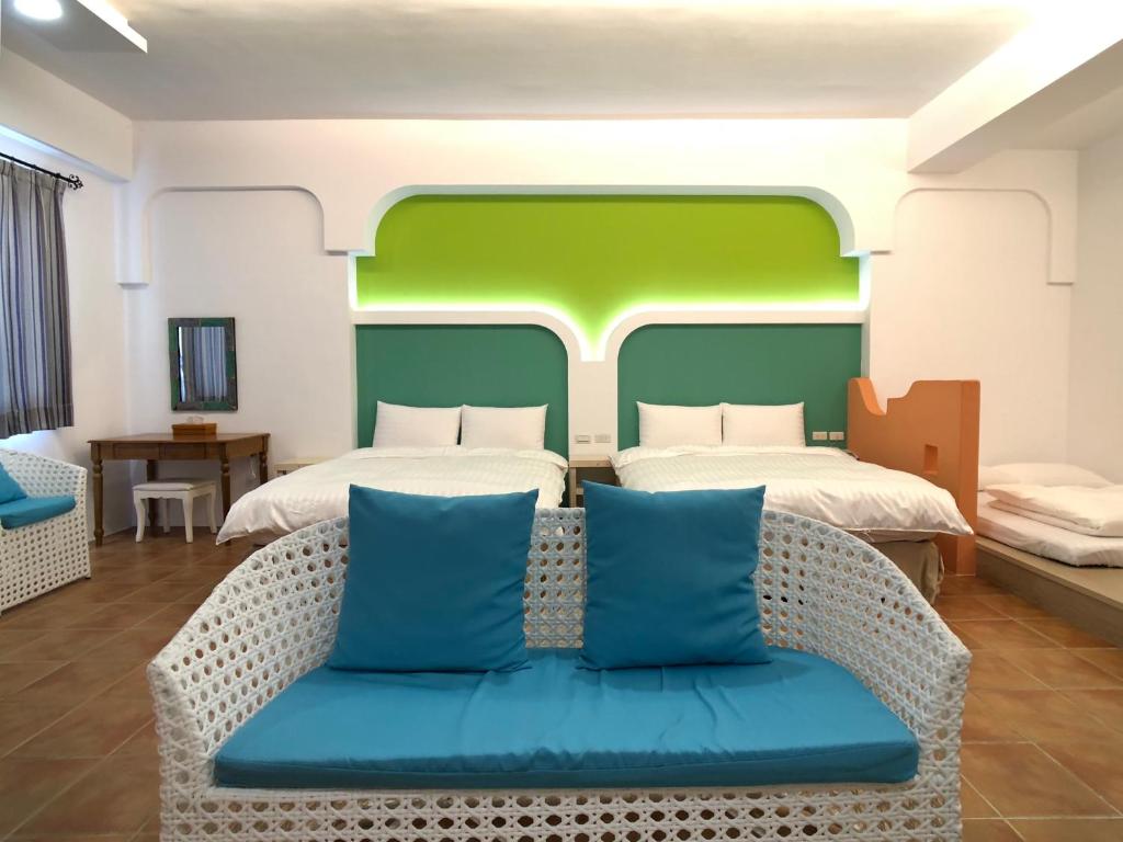 Voodi või voodid majutusasutuse Kenting True Color Hostel toas