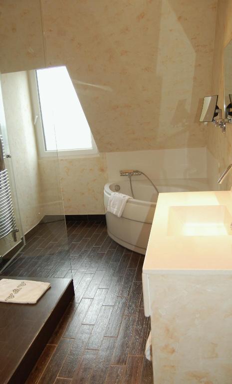 Salle de bains dans l'établissement L'Esplanade