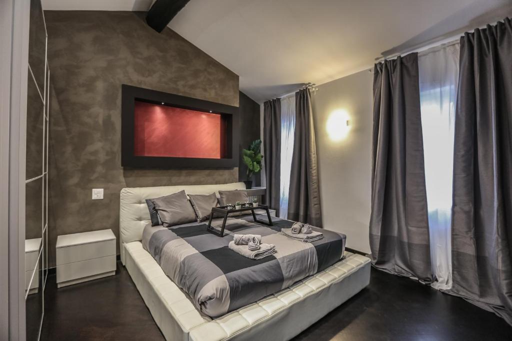 Posteľ alebo postele v izbe v ubytovaní Stylish Apartment Near Duomo