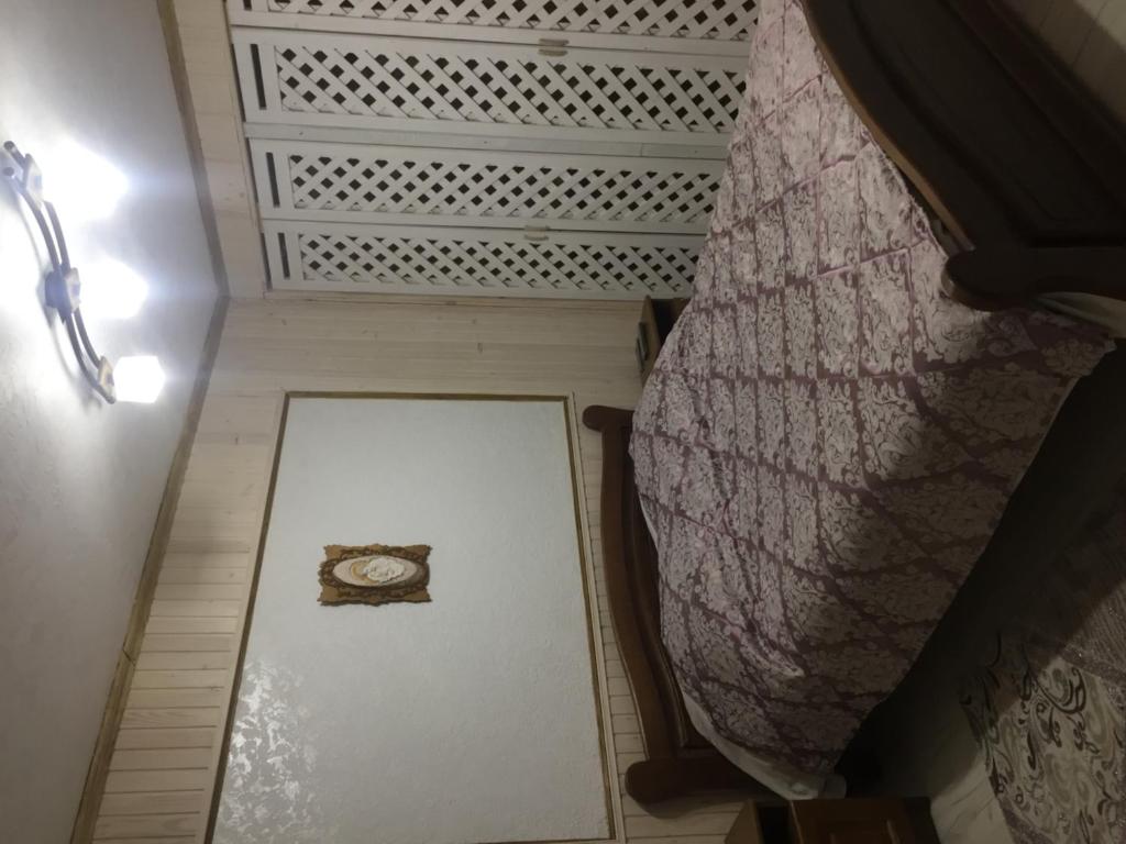 Voodi või voodid majutusasutuse Guest House U Myrona toas
