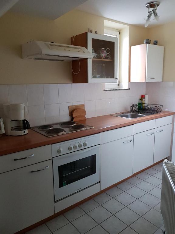 Kuchyň nebo kuchyňský kout v ubytování Gasthof Zur Friedenseiche