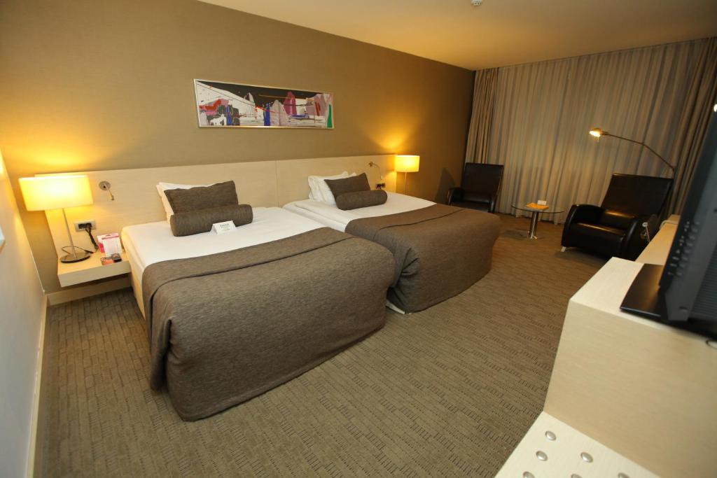 TV a/nebo společenská místnost v ubytování CPAnkara Hotel